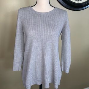 Knit sweater with open design on back